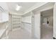 Walk-in closet with built-in shelving and hanging rods for optimal organization at 528 Bankhead Dr, Cary, NC 27519