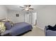 Bright bedroom featuring neutral walls and carpet at 5292 Goosecross Way, Fuquay Varina, NC 27526