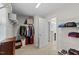 Spacious walk-in closet with shelving and room for organizing clothes and storage at 5292 Goosecross Way, Fuquay Varina, NC 27526