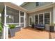 Inviting back deck features comfortable seating, creating a perfect outdoor entertaining space at 5410 Highcroft Dr, Cary, NC 27519