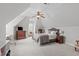 Spacious bedroom featuring a bed, writing desk, and a window nook for seating at 5410 Highcroft Dr, Cary, NC 27519