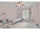 Charming pink bedroom with a single bed, canopy, and whimsical decor at 5410 Highcroft Dr, Cary, NC 27519