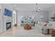 Spacious living room boasting a cozy fireplace and views of the surrounding nature at 5410 Highcroft Dr, Cary, NC 27519
