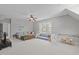 Bright living room featuring a large window, plush seating, and play area for children at 5410 Highcroft Dr, Cary, NC 27519
