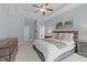 Serene main bedroom with tray ceilings, neutral decor, and ample natural light at 5410 Highcroft Dr, Cary, NC 27519