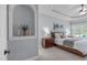 Relaxing main bedroom with tray ceilings, soft lighting, and a decorative arched wall niche at 5410 Highcroft Dr, Cary, NC 27519