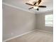 Bedroom featuring neutral carpet, ceiling fan, and bright window at 5410 Pageford Dr, Durham, NC 27703