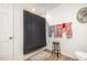 Well-lit bathroom with a shower, decorative towels and accents, and a clean, functional layout at 553 Isley Rd, Haw River, NC 27258