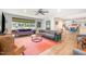 Inviting living room with lots of natural light, hardwood floors, and comfortable seating at 553 Isley Rd, Haw River, NC 27258