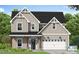 Charming two-story home featuring a classic design and a two-car garage at 70 Nebbiolo Dr, Youngsville, NC 27596