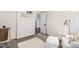Adorable Bedroom with a neutral palette and bright natural light throughout the space at 729 Mills St, Raleigh, NC 27608