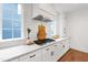 Modern kitchen with white cabinets, subway tile backsplash and new appliances at 729 Mills St, Raleigh, NC 27608