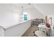 Bright playroom featuring white shiplap walls, a ' table, and an alphabet rug at 729 Mills St, Raleigh, NC 27608