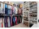 Spacious walk-in closet with custom shelving, rods, and organized storage for clothing and accessories at 729 Mills St, Raleigh, NC 27608