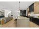 Bright, open kitchen with a large island, modern appliances, and seamless flow to the living space at 7417 Dover Hills Dr # 73, Wake Forest, NC 27587