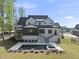 Stunning rear exterior of home with a swimming pool, hot tub, and outdoor patio at 7417 Dover Hills Dr # 73, Wake Forest, NC 27587