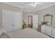 Comfortable bedroom with neutral walls, ceiling fan and closet for ample storage at 79 Heatherwood Dr, Chapel Hill, NC 27516