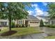 Lovely home features a well-maintained lawn, charming curb appeal, and attached two-car garage at 79 Heatherwood Dr, Chapel Hill, NC 27516