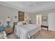 Comfortable main bedroom with a tray ceiling and ensuite bathroom at 79 Heatherwood Dr, Chapel Hill, NC 27516