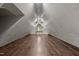 This spacious attic features wood-look floors, a window, and built-in lighting at 800 Linens St, Graham, NC 27253