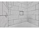 Bathroom features a tiled shower with a built-in niche at 800 Linens St, Graham, NC 27253