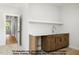Stylish kitchenette featuring sleek countertops, modern fixtures, and ample cabinet space at 8021 Bud Morris Rd, Wake Forest, NC 27587