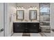 This bathroom has a dual vanity with granite counters, modern fixtures, and a glass-enclosed shower at 805 Narrative Ln, Durham, NC 27703