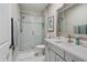 Modern bathroom with a glass-enclosed shower, white vanity, and stylish fixtures at 805 Narrative Ln, Durham, NC 27703