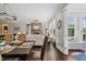 Dining room with view of living room and a deck at 805 Narrative Ln, Durham, NC 27703