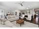 Bright and airy living room with open floor plan connected to the kitchen, offering a perfect space for entertaining at 805 Narrative Ln, Durham, NC 27703