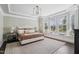 Serene main bedroom features a bay window with bench seating and a decorative chandelier at 805 Narrative Ln, Durham, NC 27703