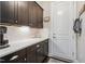 Mudroom features custom cabinets, countertop, and convenient storage at 805 Narrative Ln, Durham, NC 27703