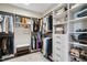 Spacious walk-in closet features custom shelving, hanging rods, and ample storage space at 805 Narrative Ln, Durham, NC 27703