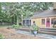 Charming backyard with a deck and screened-in porch, perfect for outdoor living at 813 Burch Ave, Durham, NC 27701