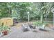 Landscaped backyard with a shed, fire pit, and outdoor seating area for entertaining at 813 Burch Ave, Durham, NC 27701