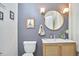 Renovated half bathroom on main floor with neutral paint at 813 Burch Ave, Durham, NC 27701