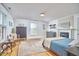 Spacious bedroom with hardwood floors, a fireplace, and a window for natural light at 813 Burch Ave, Durham, NC 27701