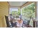 Relaxing front porch with rocking chairs, flowers, and charming details for outdoor enjoyment at 813 Burch Ave, Durham, NC 27701