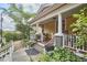 Inviting covered front porch with ample seating and classic architectural details at 813 Burch Ave, Durham, NC 27701