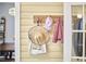 Coat rack and bags hang on the hallway wall at 813 Burch Ave, Durham, NC 27701