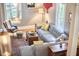 Comfortable living room with hardwood floors, stylish furniture, and natural light at 813 Burch Ave, Durham, NC 27701