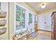 Bright mud room with a view to the backyard at 813 Burch Ave, Durham, NC 27701