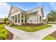 Well-maintained clubhouse with landscaped grounds, concrete sidewalk, and stylish architectural details at 825 Abbyberry Dr, Wake Forest, NC 27587