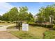 Community amenities with gazebo, benches, and walking path surrounded by lush trees and bushes at 825 Abbyberry Dr, Wake Forest, NC 27587