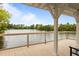 Open-air pavilion overlooking a serene lake, offering a tranquil outdoor retreat at 825 Abbyberry Dr, Wake Forest, NC 27587