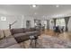 Open-concept living space featuring a comfortable living room, dining area, and modern kitchen at 825 Abbyberry Dr, Wake Forest, NC 27587