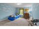 Fun bedroom design with car-themed bed, mural, and playful decor at 831 Poplar St, Durham, NC 27703