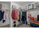 Walk-in closet offers organized shelving, hanging racks, and storage solutions at 831 Poplar St, Durham, NC 27703