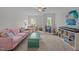 Cozy living area with a sofa and lots of room for activities at 831 Poplar St, Durham, NC 27703