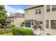 View of the rear of the home featuring a deck, screened porch, and landscaped backyard at 9013 Dansforeshire Way, Wake Forest, NC 27587